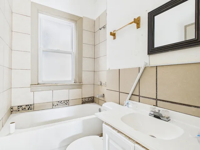 a bathroom with a sink and a bathtub