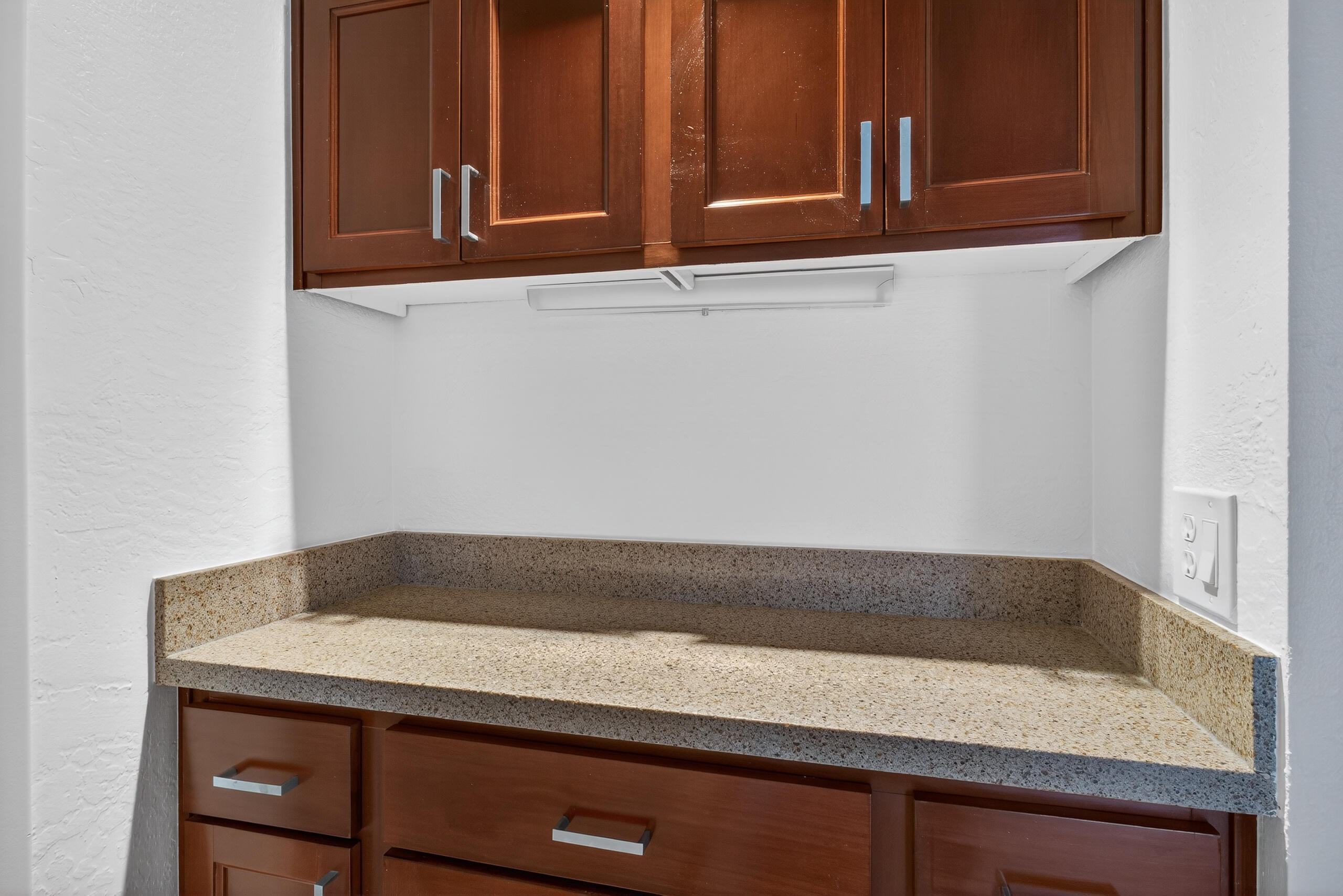 1050 Ramon Road, Unit 127 Palm Springs, CA 92264 - Photo 13 of 29 a kitchen with a sink and cabinets