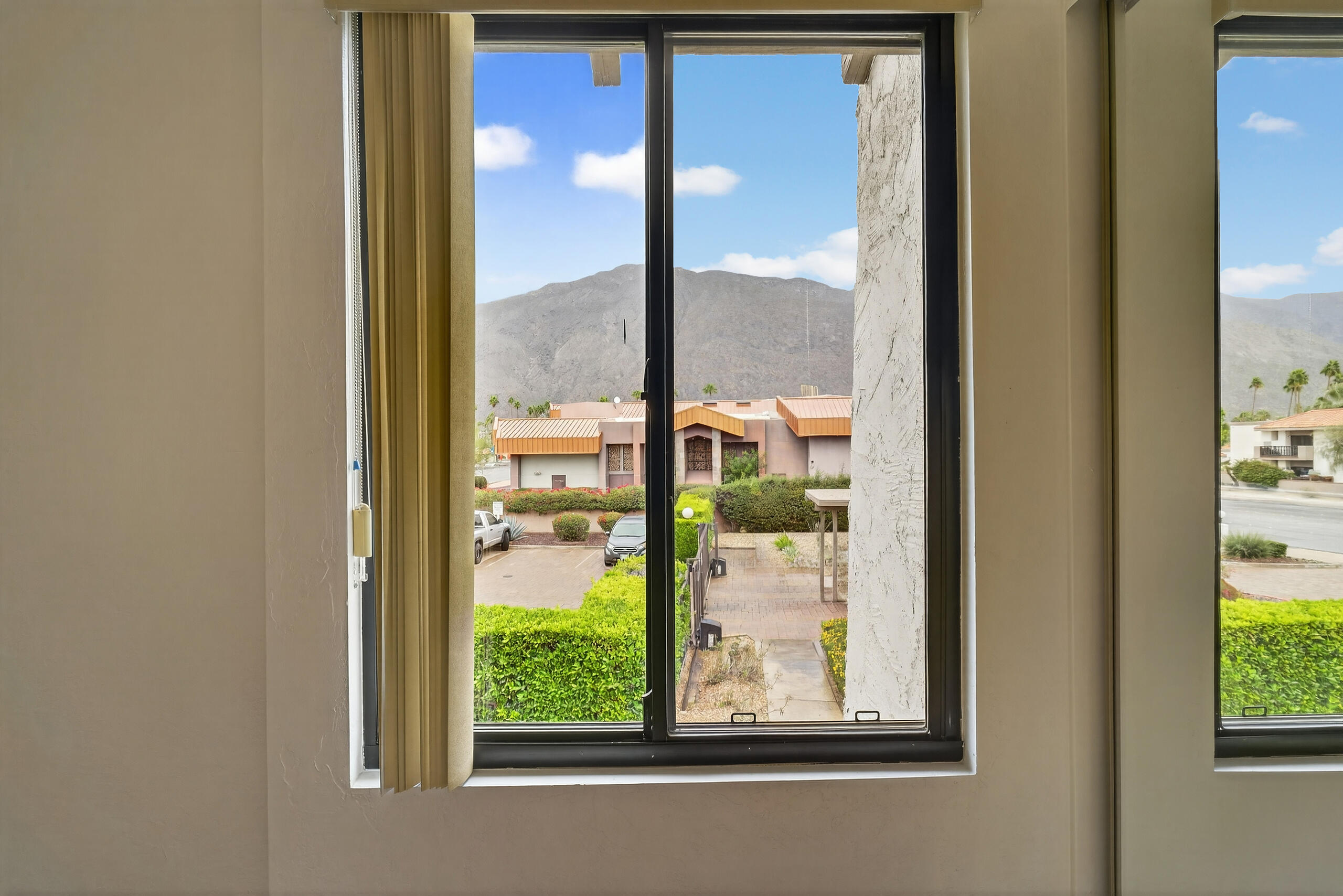 1050 Ramon Road, Unit 127 Palm Springs, CA 92264 - Photo 18 of 29 a view of a window