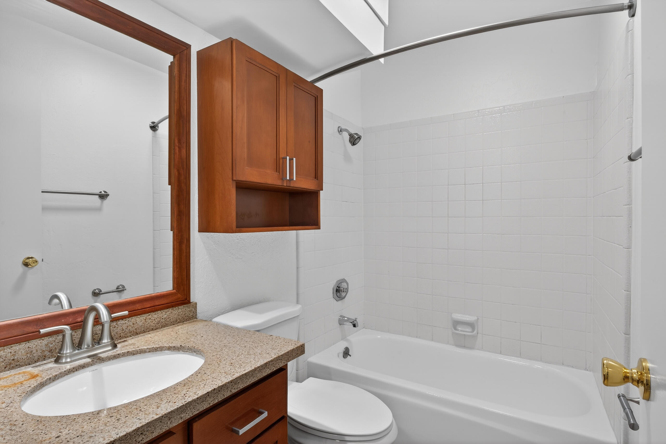1050 Ramon Road, Unit 127 Palm Springs, CA 92264 - Photo 19 of 29 a bathroom with a sink and a mirror