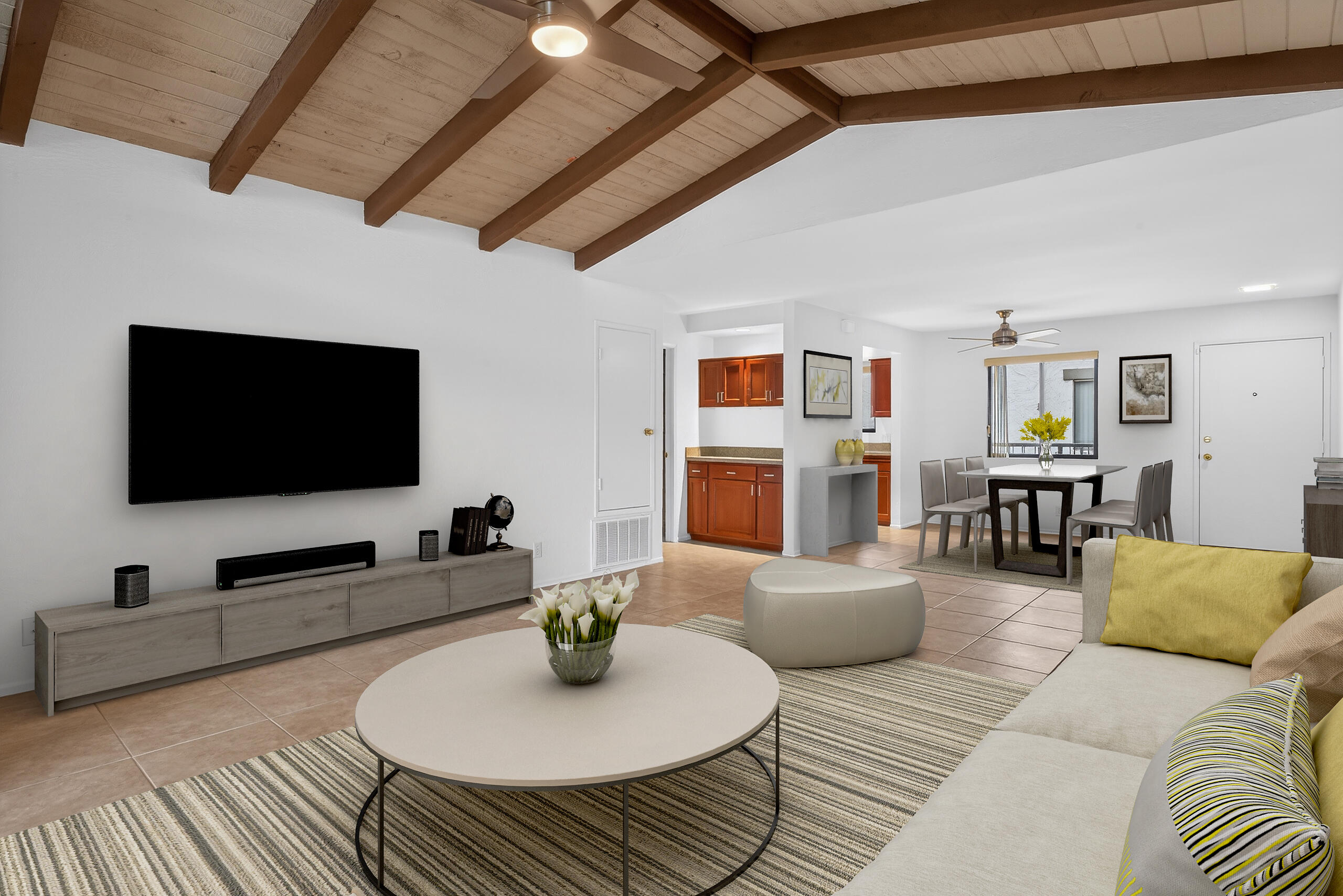 1050 Ramon Road, Unit 127 Palm Springs, CA 92264 - Photo 3 of 29 a living room with furniture and a flat screen tv