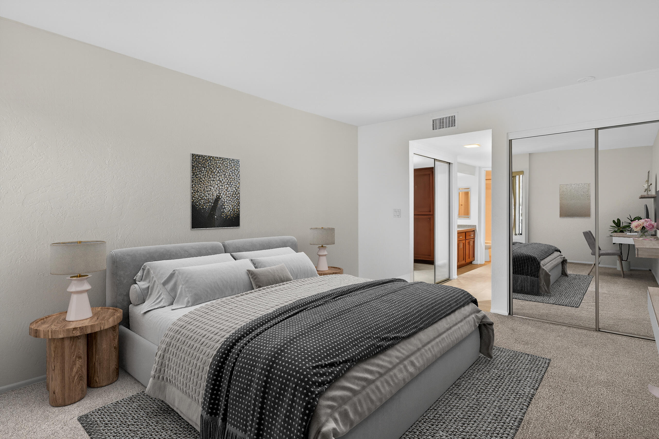 1050 Ramon Road, Unit 127 Palm Springs, CA 92264 - Photo 4 of 29 a bedroom with a large bed and a couch
