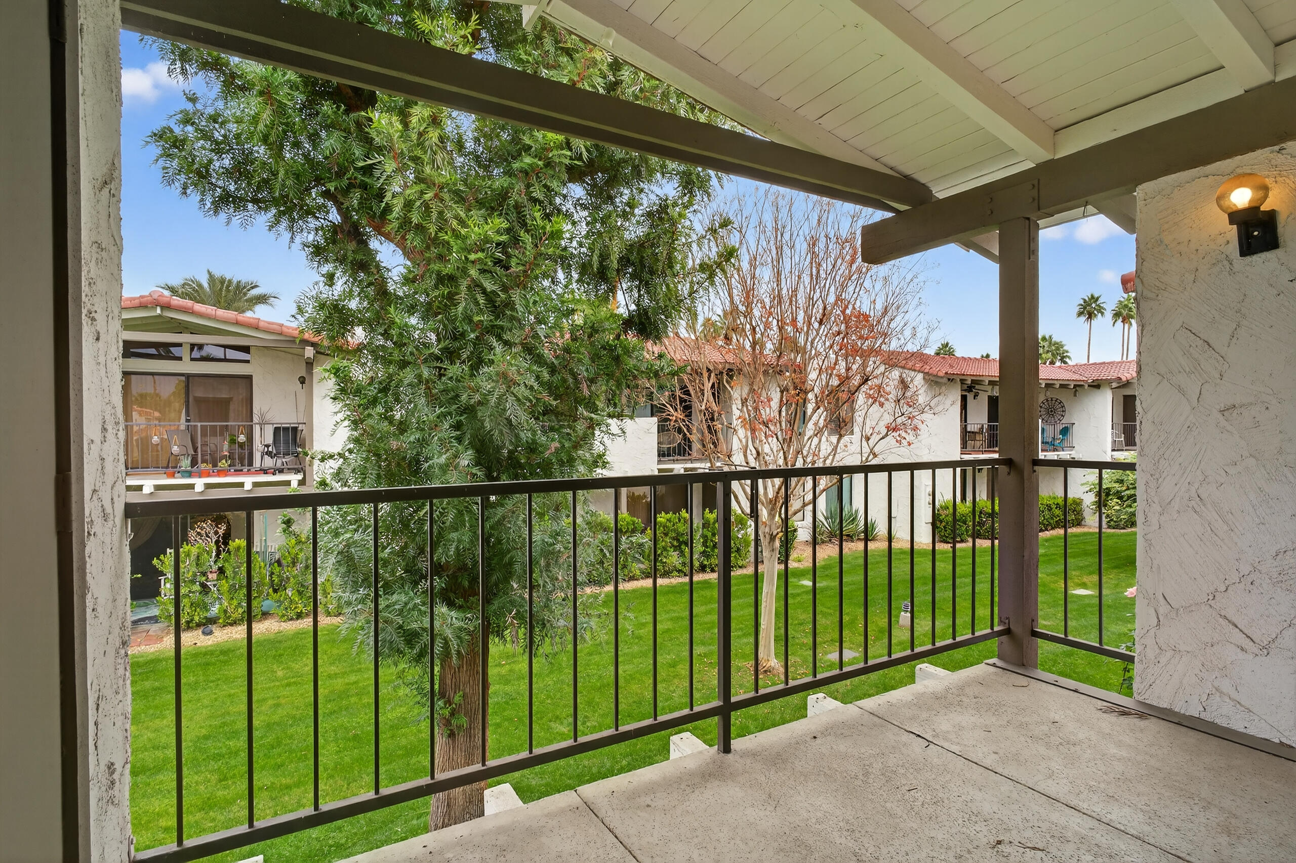 1050 Ramon Road, Unit 127 Palm Springs, CA 92264 - Photo 5 of 29 a view of a balcony