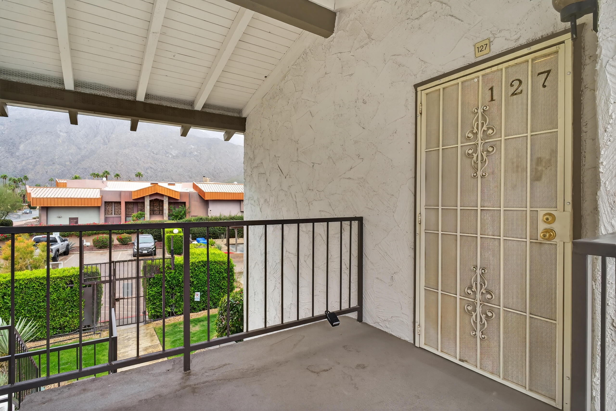 1050 Ramon Road, Unit 127 Palm Springs, CA 92264 - Photo 7 of 29 a view of a balcony