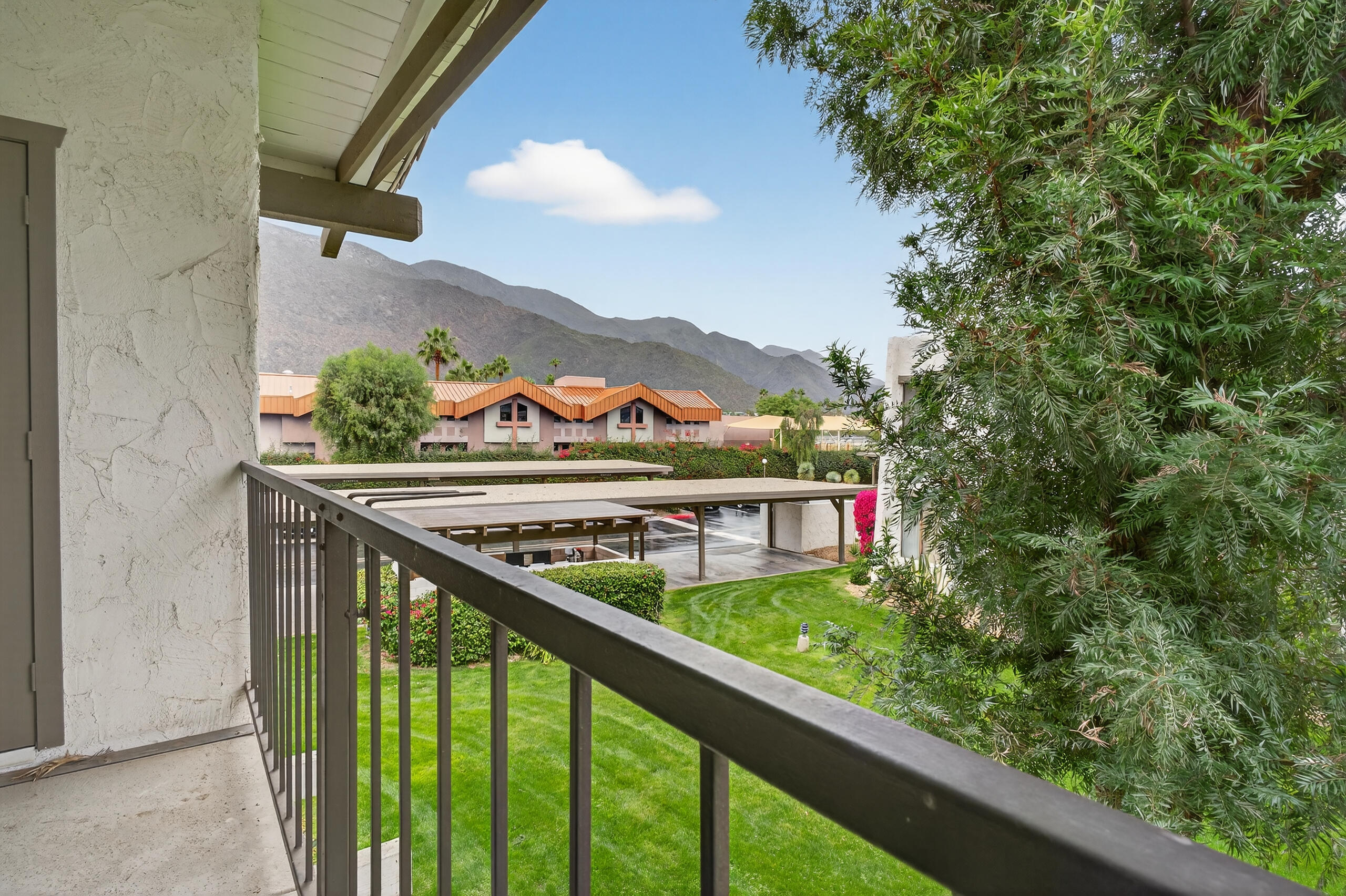 1050 Ramon Road, Unit 127 Palm Springs, CA 92264 - Photo 10 of 29 a city view from a balcony