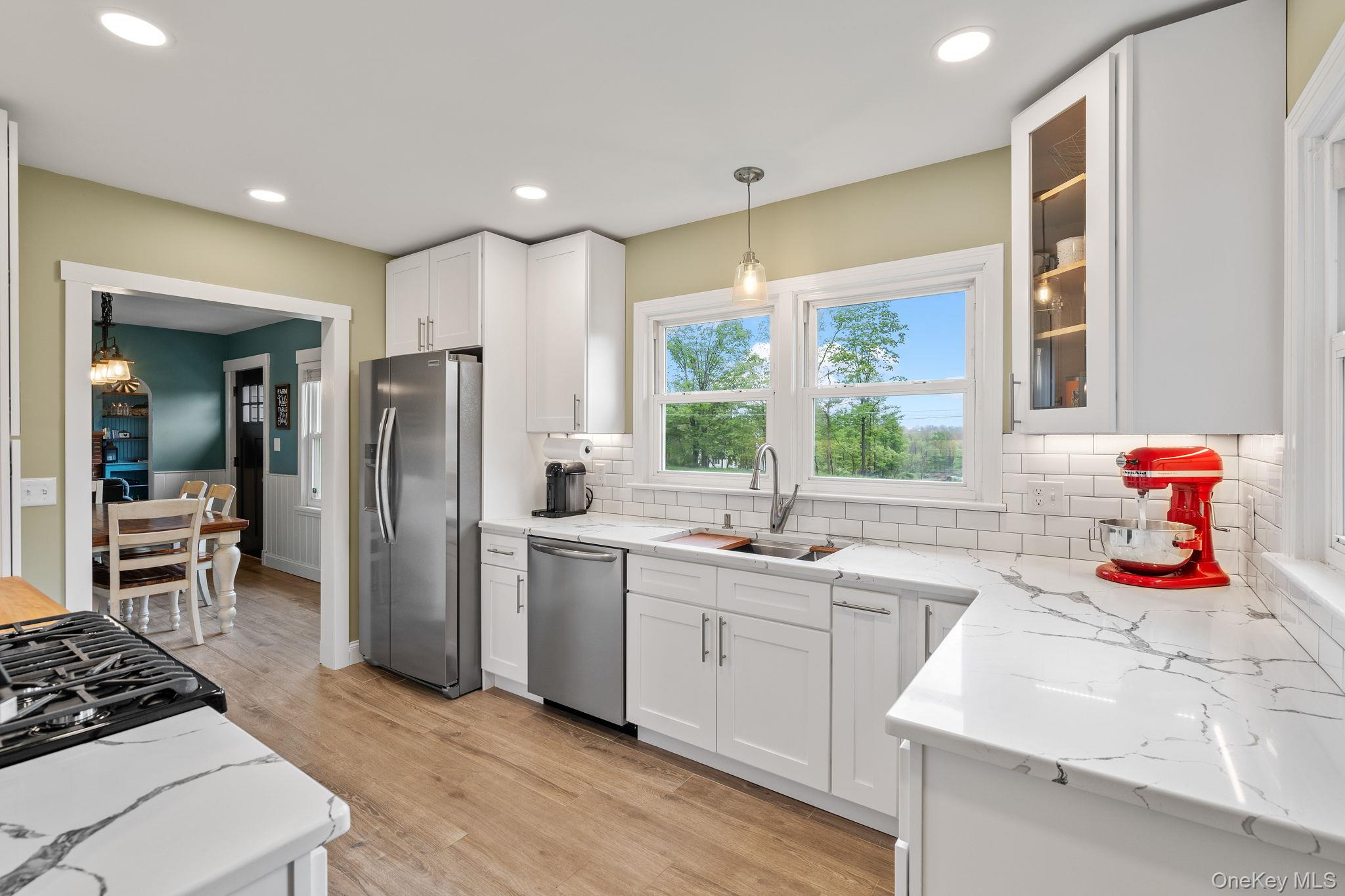 1327 County Rte 17 Montgomery, NY 12549 - Photo 2 of 37 a kitchen with stainless steel appliances a sink stove and refrigerator