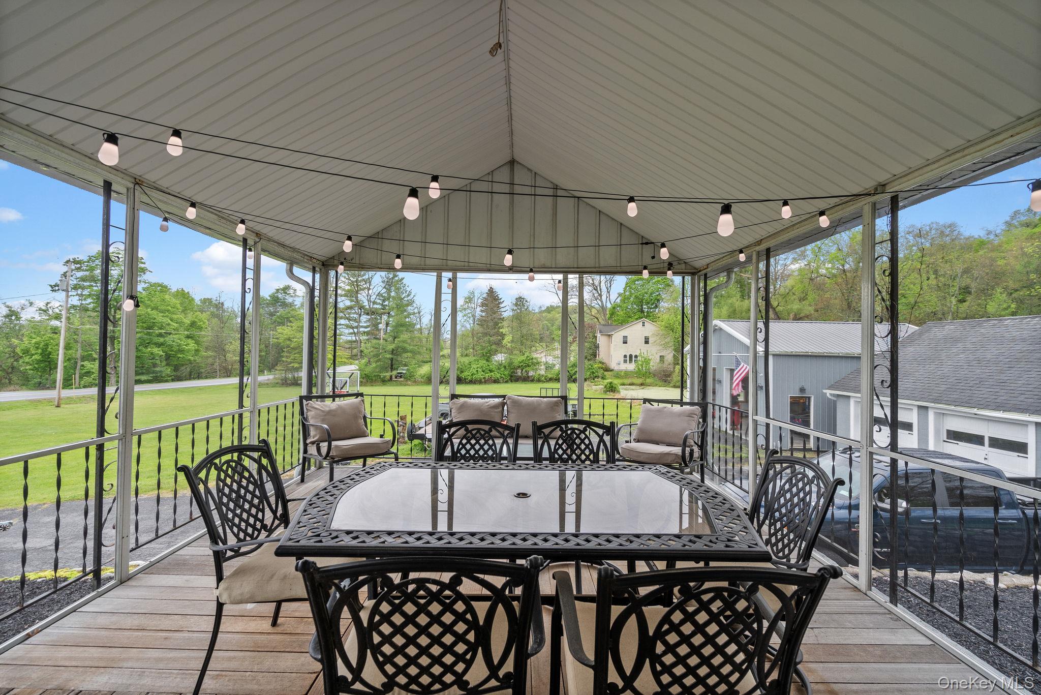 1327 County Rte 17 Montgomery, NY 12549 - Photo 24 of 37 a view of balcony with furniture and outdoor seating