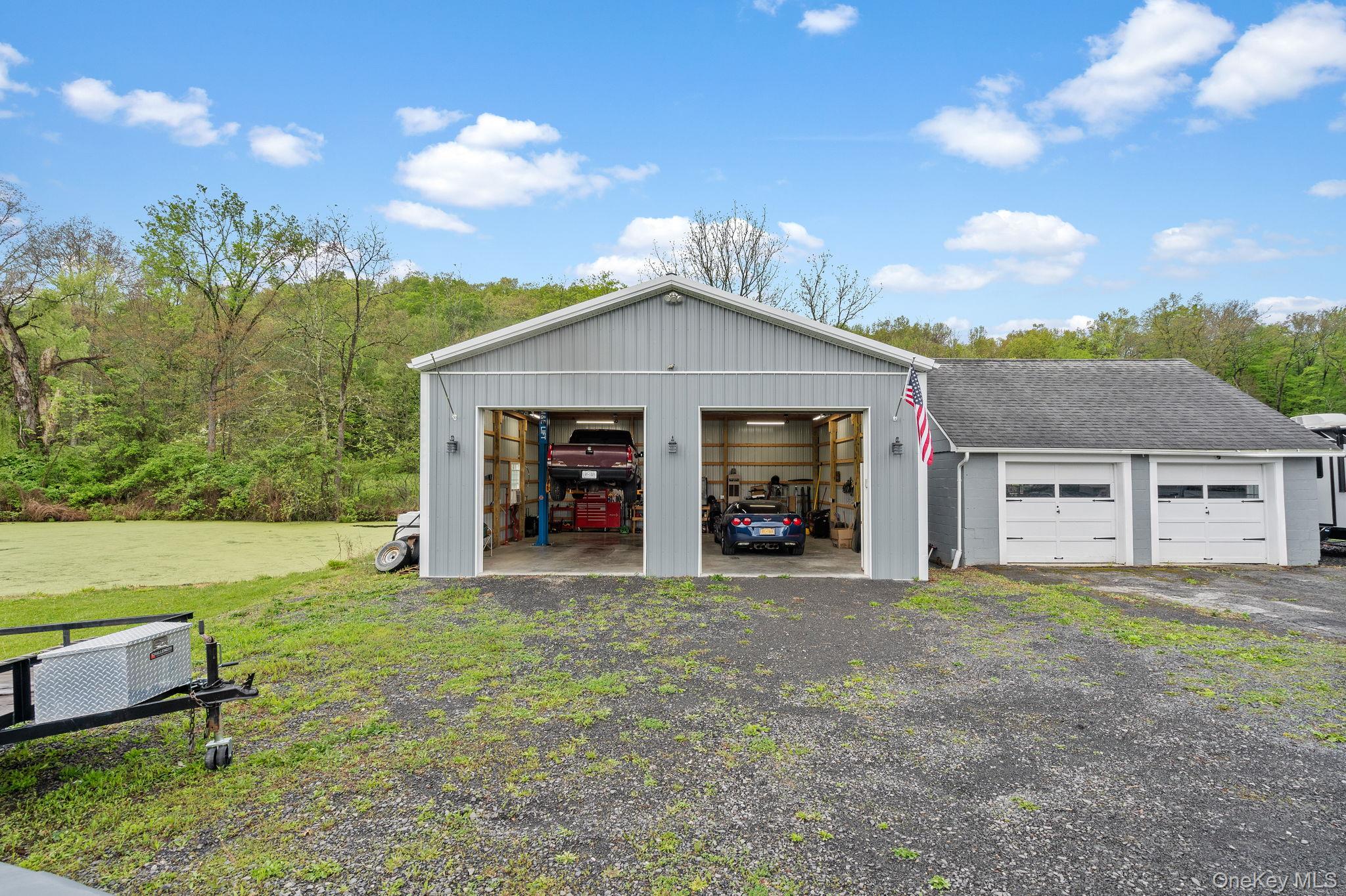 1327 County Rte 17 Montgomery, NY 12549 - Photo 29 of 37 a view of a house with a yard and sitting area