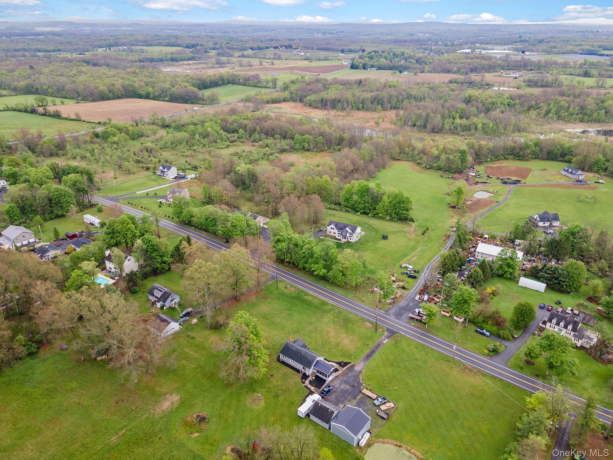 1327 County Rte 17 Montgomery, NY 12549 - Photo 34 of 37 an aerial view of lake residential houses with outdoor space and swimming pool