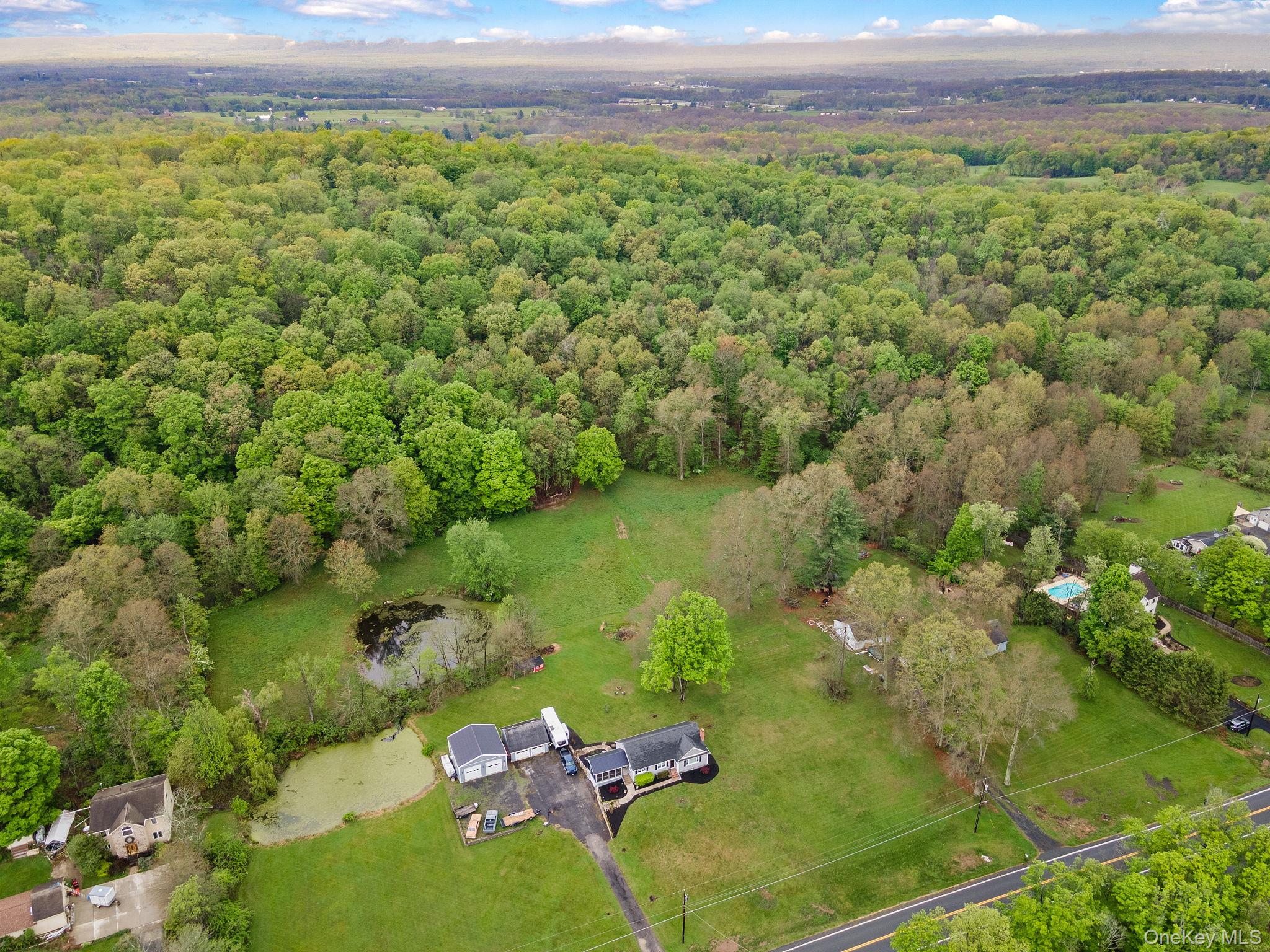 1327 County Rte 17 Montgomery, NY 12549 - Photo 36 of 37 a view of a garden with a lake view