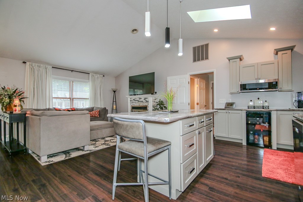 1966 Spring Grove Madison, OH 44057 - Photo 18 of 50 LVP Wood Flooring creates a great flow through the open area