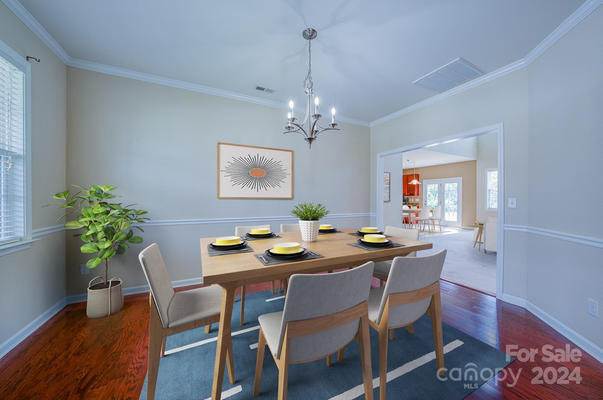 234 Roanoke Road Fletcher, NC 28732 - Photo 10 of 24 a dining room with furniture potted plants and wooden floor