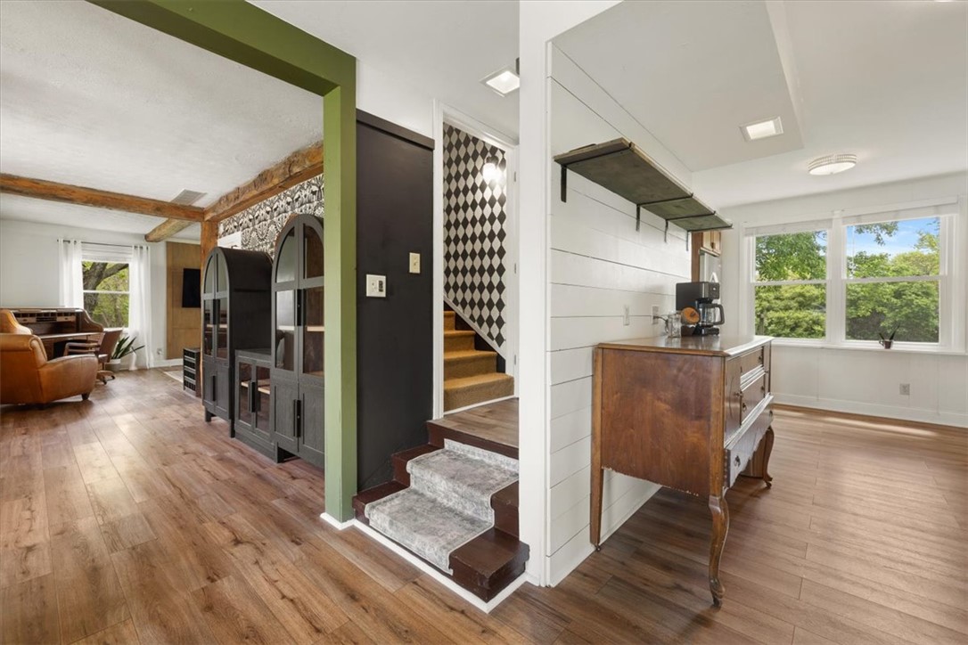5120 Wheelock Road Troy, OH 45373 - Photo 24 of 67 This inviting interior features elegant flooring, exposed beams, and a well-appointed stairway leading to additional space.