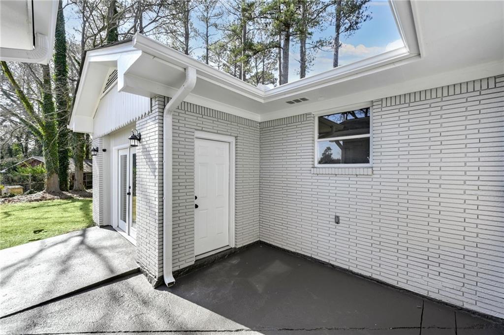 1963 Shepherd Circle Southwest Atlanta, GA 30311 - Photo 35 of 40 a view of a house with a yard