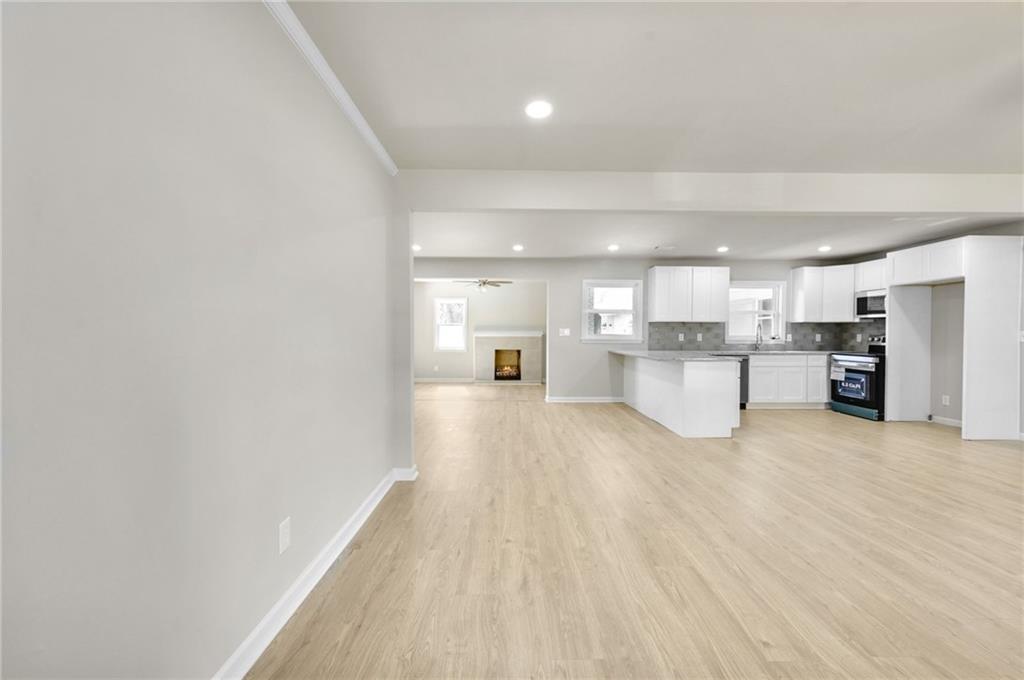 1963 Shepherd Circle Southwest Atlanta, GA 30311 - Photo 4 of 40 a view of a kitchen with wooden floor
