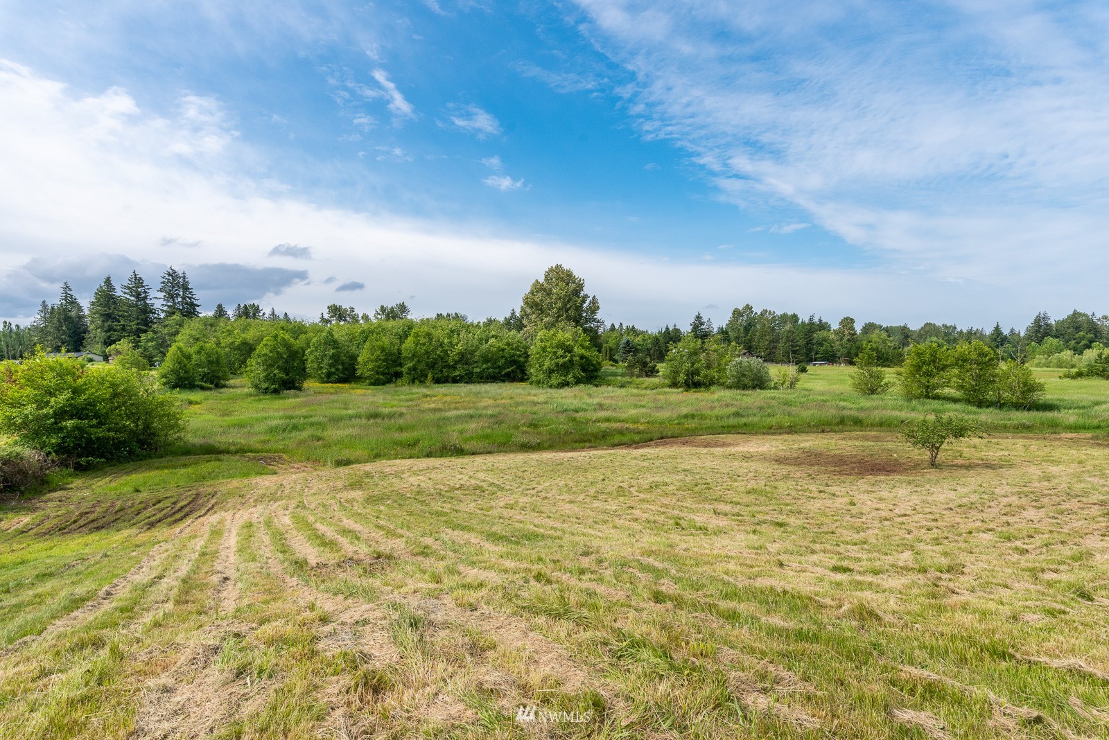 0 East Axton Road Bellingham, WA 98226 - Photo 15 of 19 a view of a lake with houses in the back