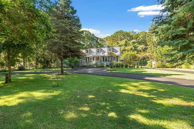 a view of building with trees in the background