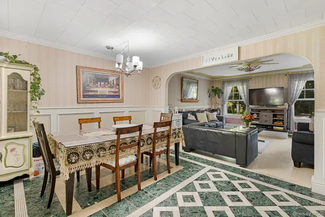 a view of a dining room with furniture