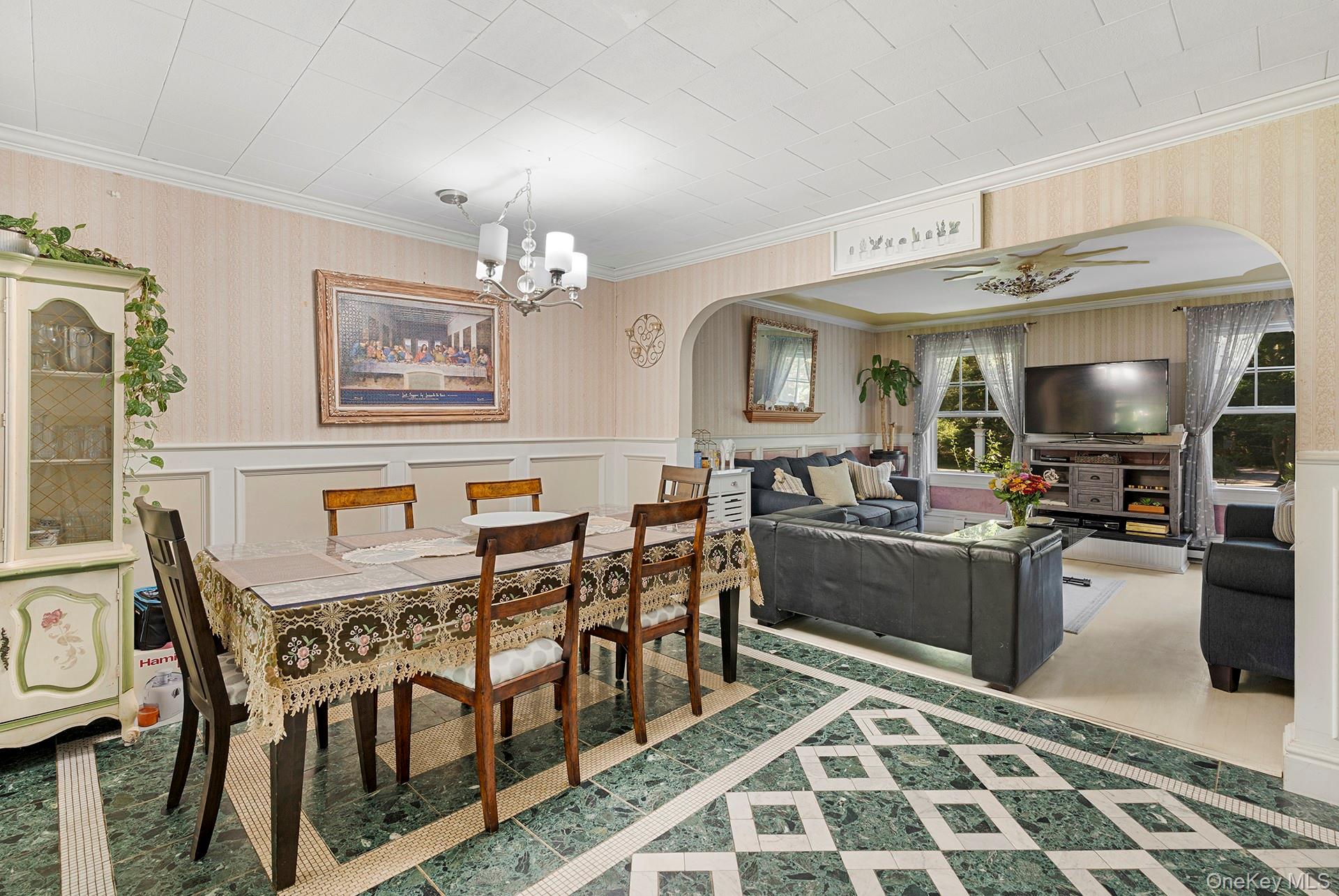 18 Glade Road Springs, NY 11937 - Photo 7 of 12 a view of a dining room with furniture