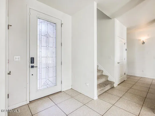 a kitchen with granite countertop cabinets stainless steel appliances and wooden floor