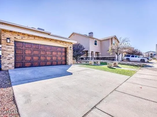 a view of an empty room with a fireplace