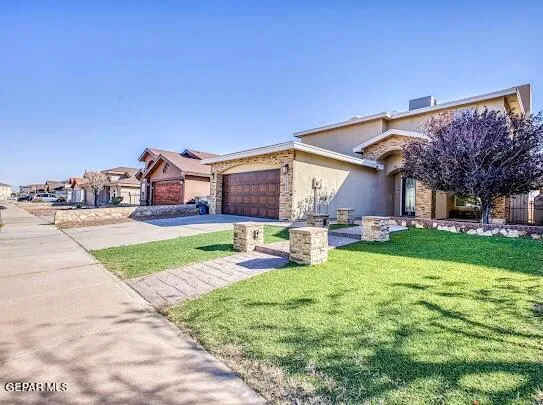 a view of a electric appliances and windows in a room