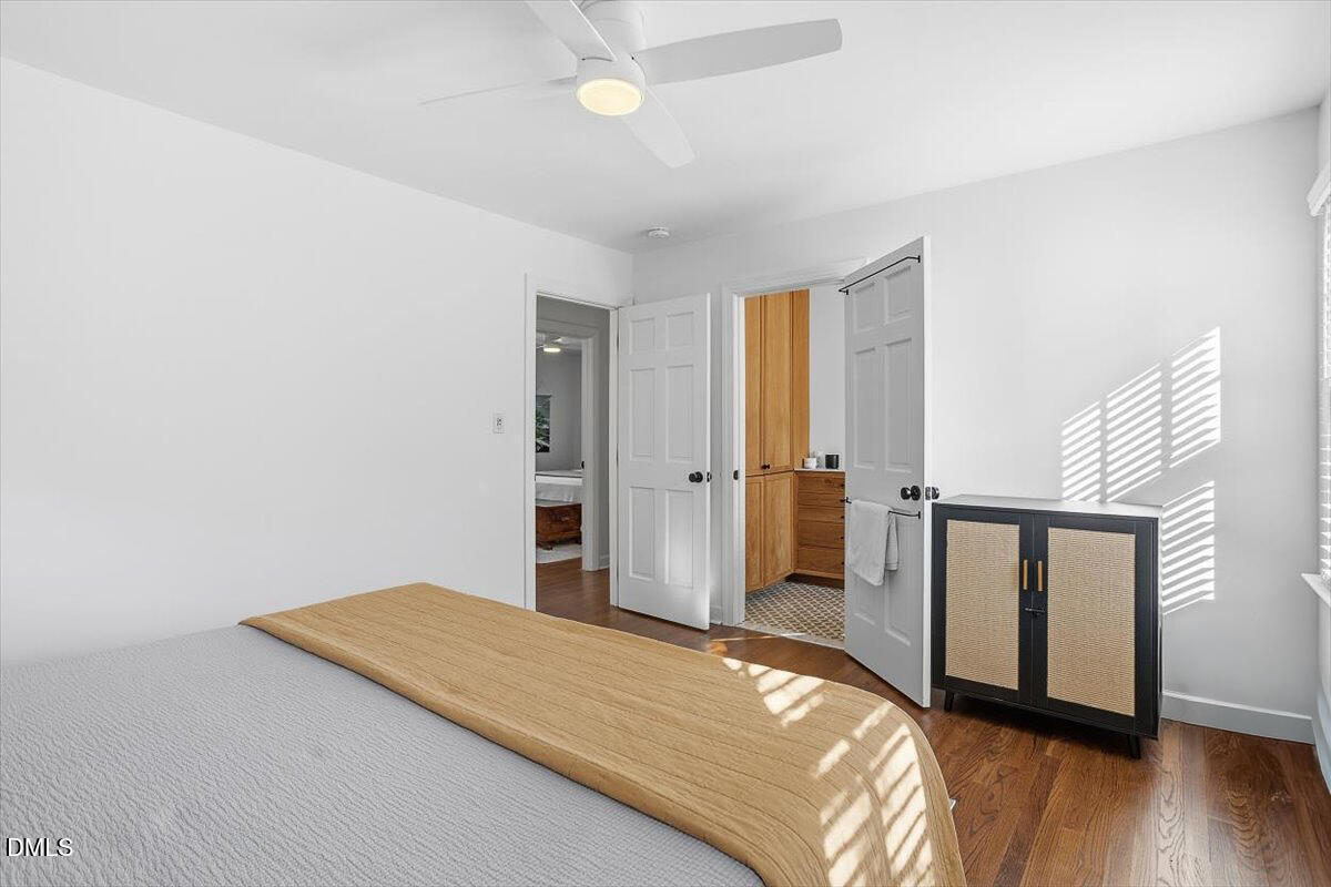 5904 Volant Drive Raleigh, NC 27609 - Photo 26 of 42 a bedroom with a bed and a window