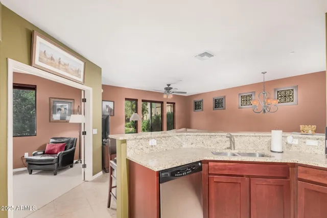 a view of living room with granite countertop furniture and dresser