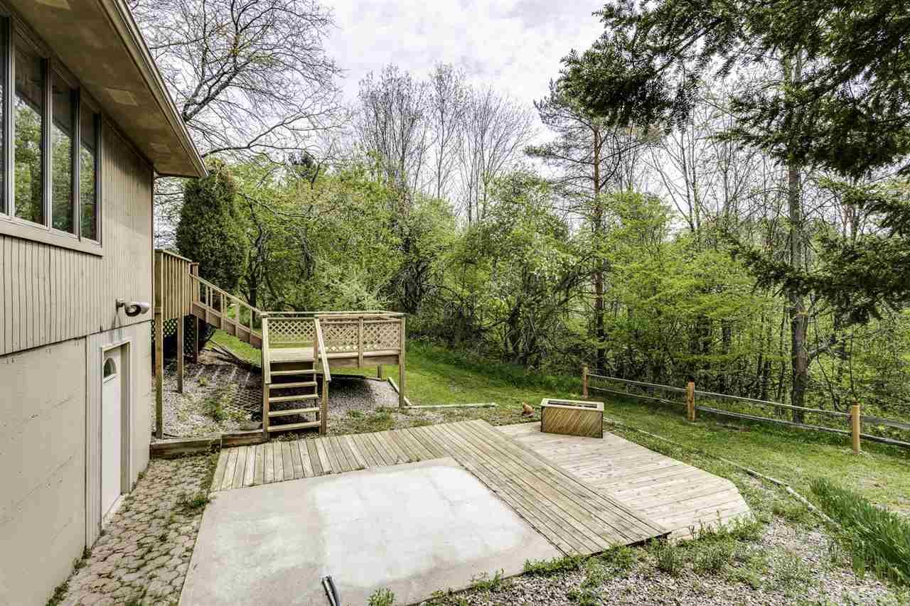 5688 Morin Road Palms, MI 48465 - Photo 36 of 53 Backyard Deck/Patio