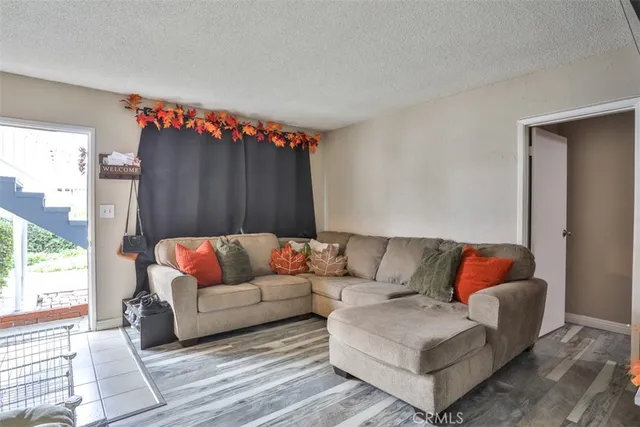 a living room with furniture and a couch