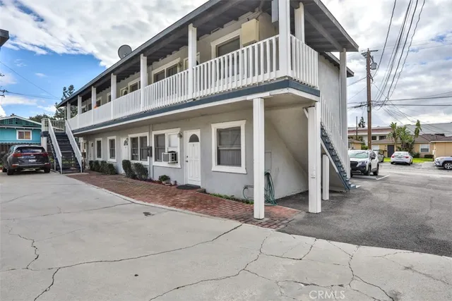 a view of a car park in front of a building