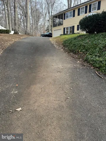 a view of a house with a street