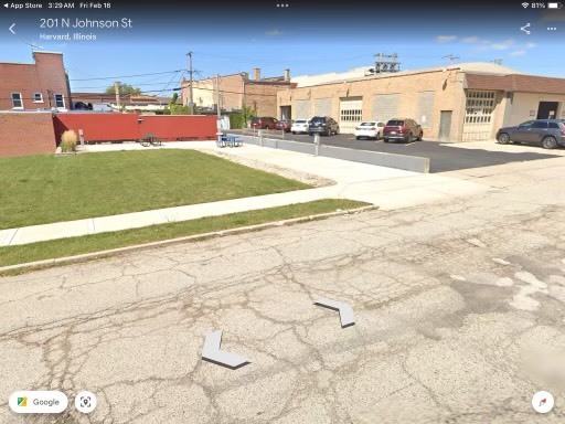 200 North Johnson Street Harvard, IL 60033 - Photo 3 of 4 a view of a street with cars