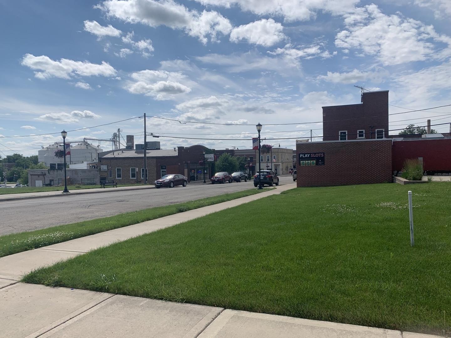 200 North Johnson Street Harvard, IL 60033 - Photo 4 of 4 a view of green field with house in the background