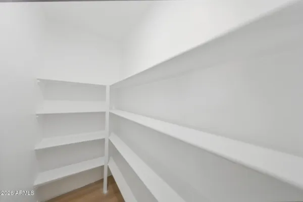 a view of an empty walk in closet