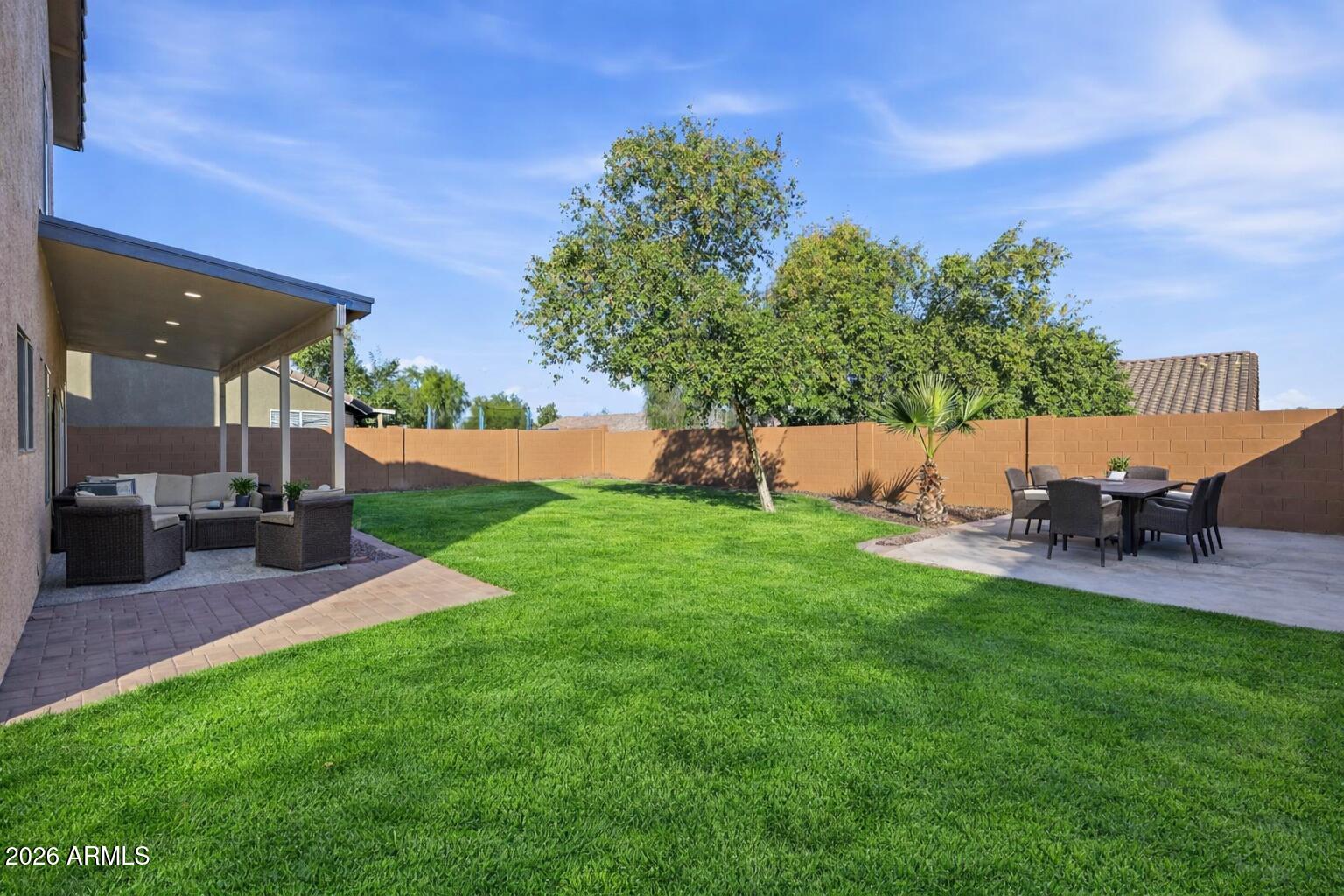 916 East Harwell Road Phoenix, AZ 85042 - Photo 24 of 27 a view of backyard with seating area and green space