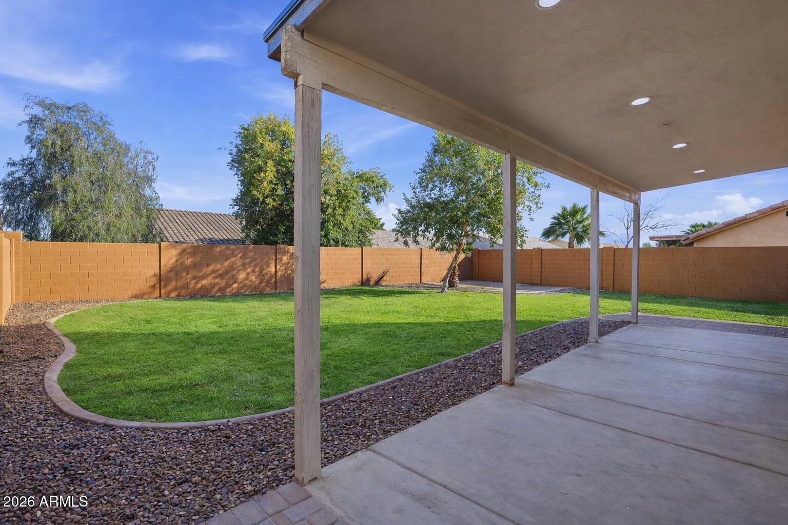 916 East Harwell Road Phoenix, AZ 85042 - Photo 25 of 27 a view of a small yard in front of a house
