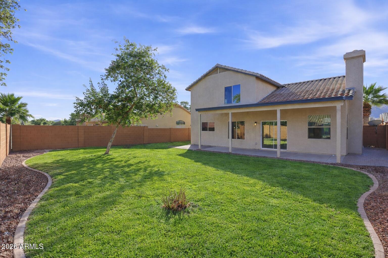 916 East Harwell Road Phoenix, AZ 85042 - Photo 26 of 27 a view of house with backyard