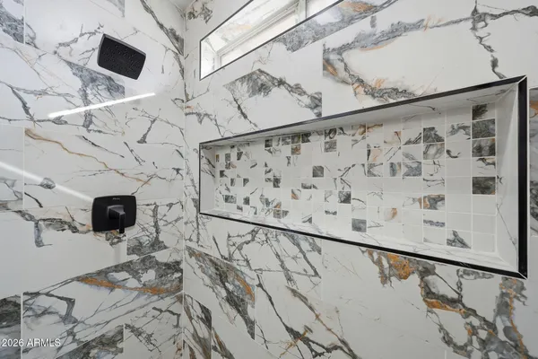 a view of backyard with seating area and green space