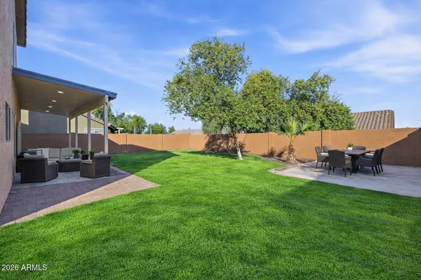 a view of a small yard in front of a house