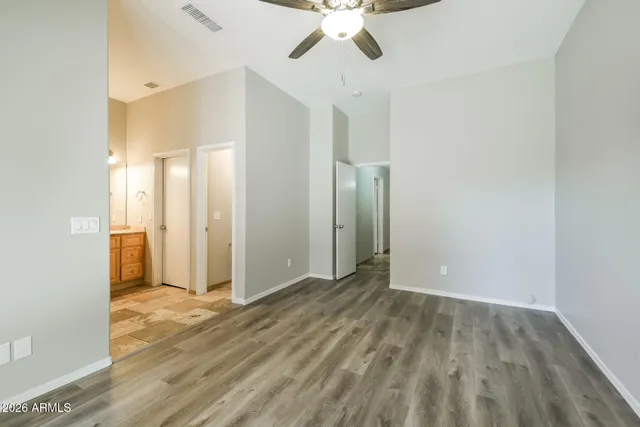 a view of livingroom with hardwood floor and ceiling fan