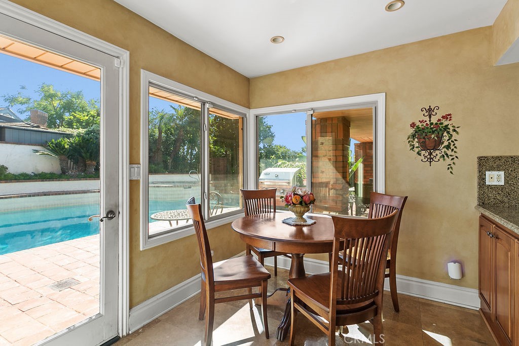 18811 Ridgeview Circle Villa Park, CA 92861 - Photo 22 of 34 a view of a dining room with furniture window and wooden floor