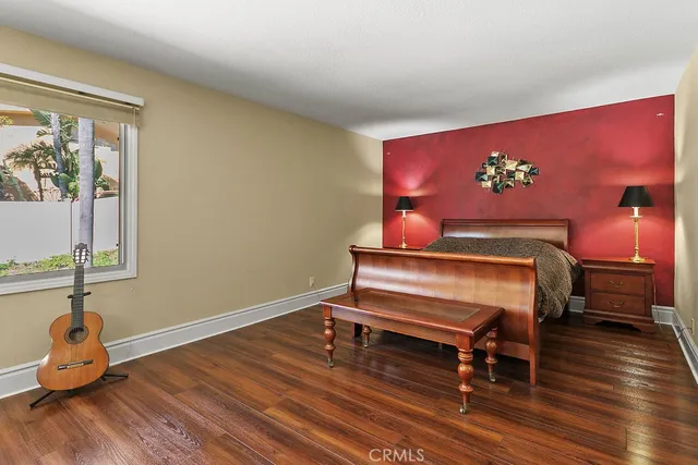 a room with furniture and wooden floor