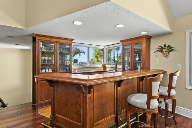 a kitchen with a table and chairs in it