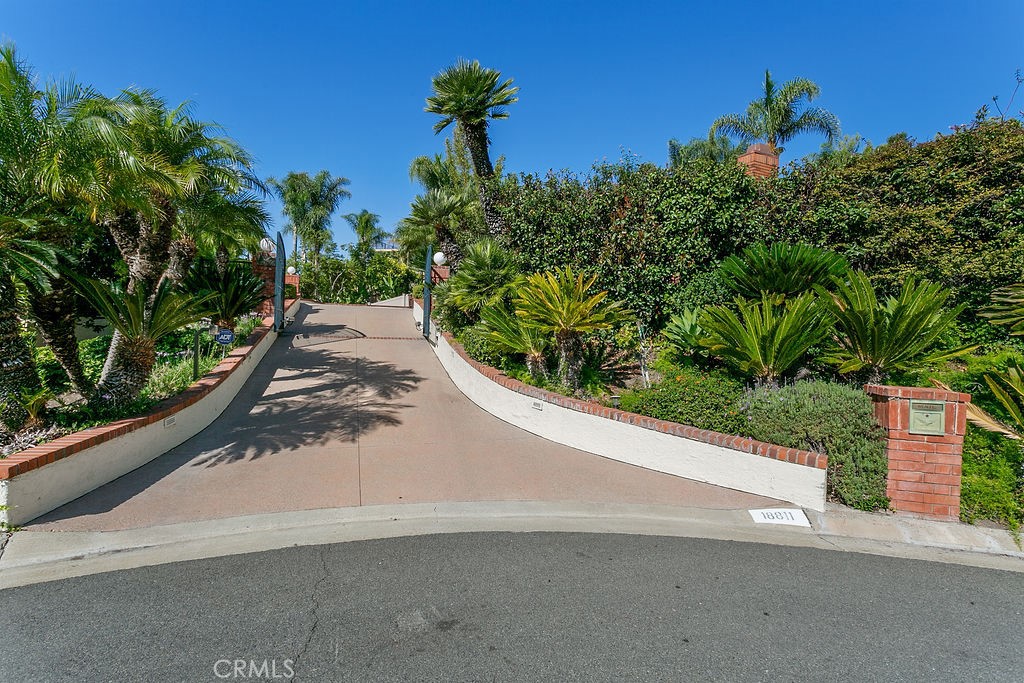 18811 Ridgeview Circle Villa Park, CA 92861 - Photo 3 of 34 a view of a street with a flower garden