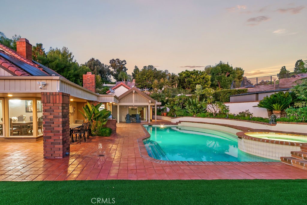 18811 Ridgeview Circle Villa Park, CA 92861 - Photo 34 of 34 a view of a house with a yard patio and swimming pool