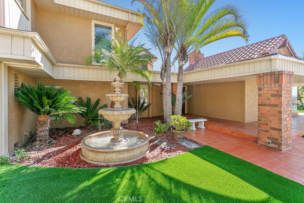18811 Ridgeview Circle Villa Park, CA 92861 - Photo 7 of 34 a view of a chair and table in backyard of the house