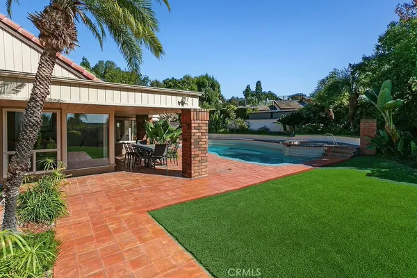 a view of outdoor space yard deck patio and swimming pool