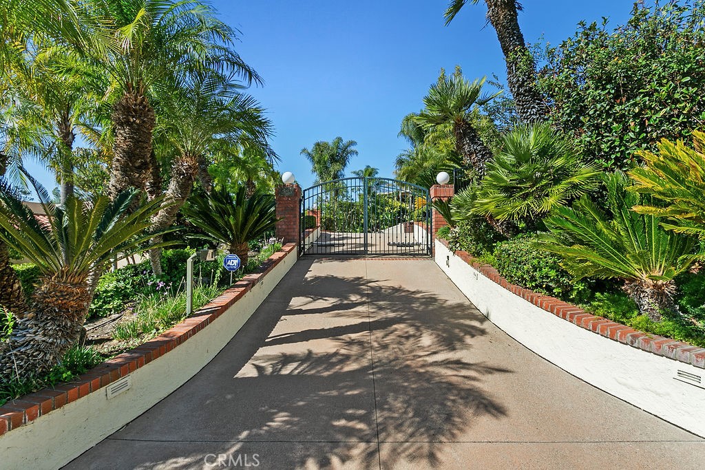 18811 Ridgeview Circle Villa Park, CA 92861 - Photo 9 of 34 a view of a garden with wooden bench