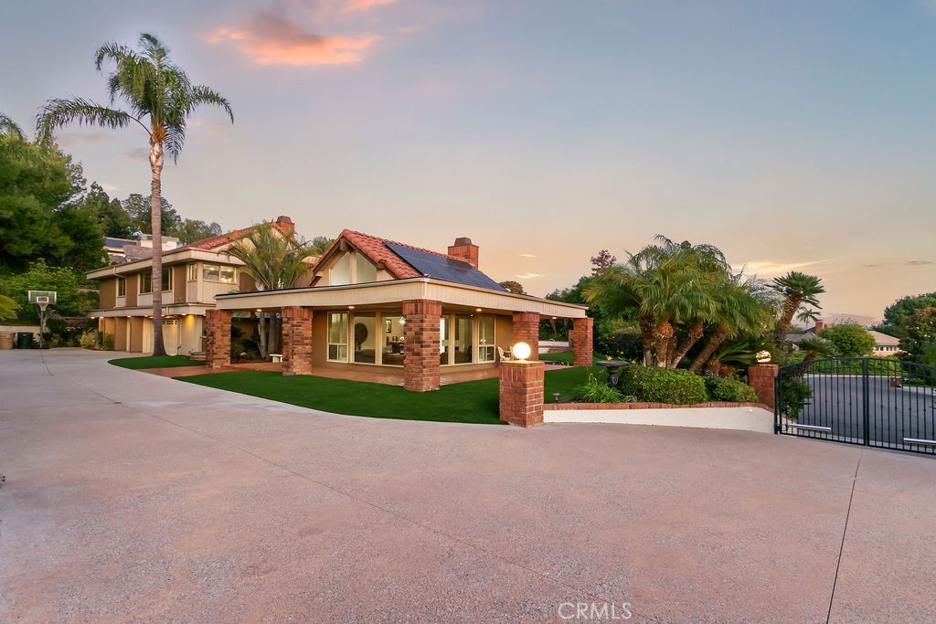 18811 Ridgeview Circle Villa Park, CA 92861 - Photo 10 of 34 a front view of a house with garden